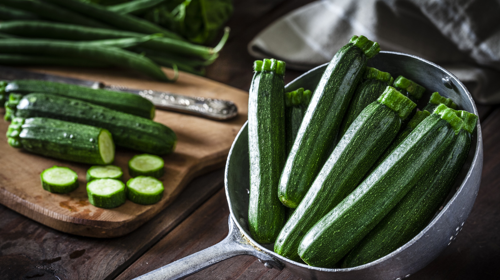 Zucchini in an old metal colander